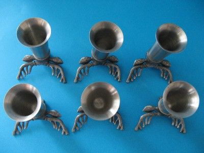   SHOT GLASSES. SET OF SIX STAINLESS W/PEWTER DEER STAG HEAD  